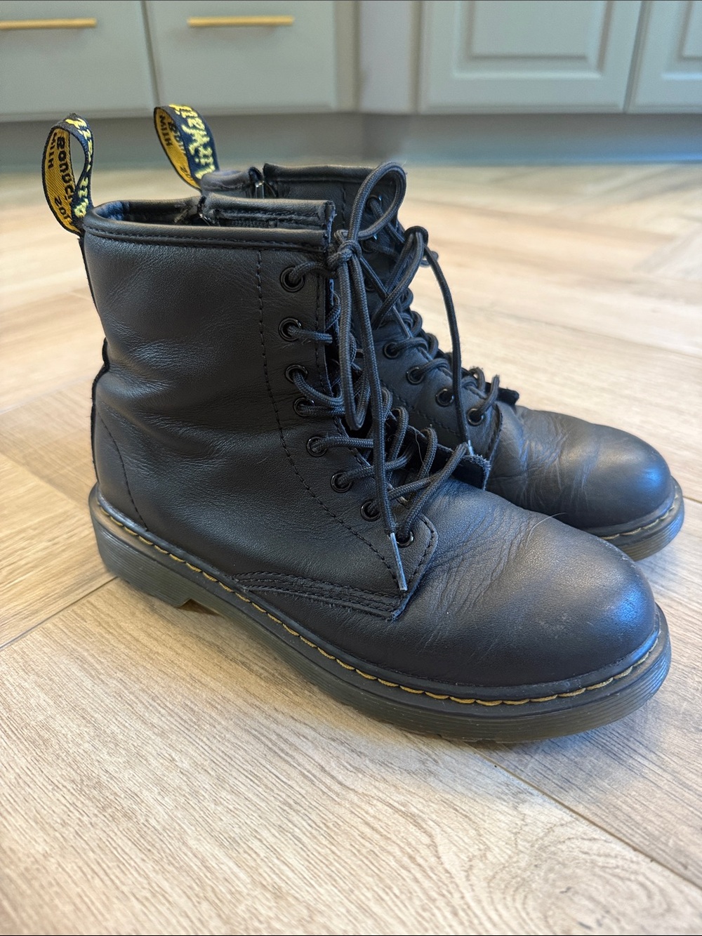 Dr. Martens Kids Black Leather Lace-Up Ankle Boots with Yellow Pull Tabs